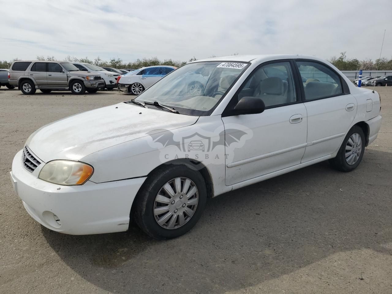 Kia Spectra BASE 1.8L 4 2003