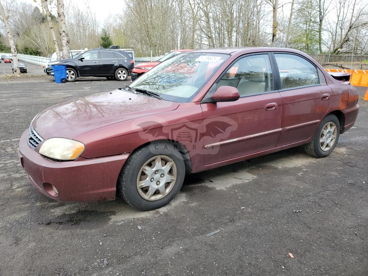Kia Spectra BASE 1.8L 4 2003