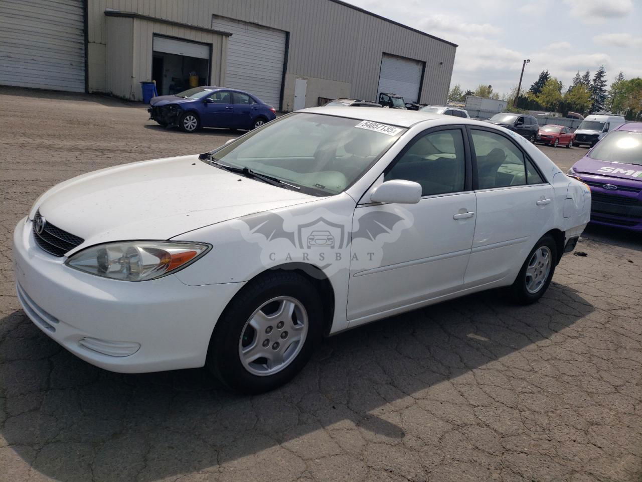 Toyota Camry LE 2.4L  4 2002