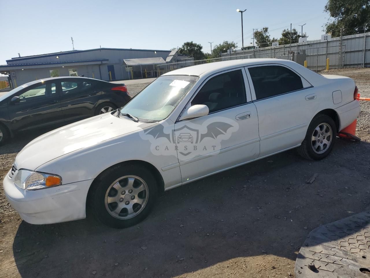 Mazda 626 LX 2.0L 4 2002