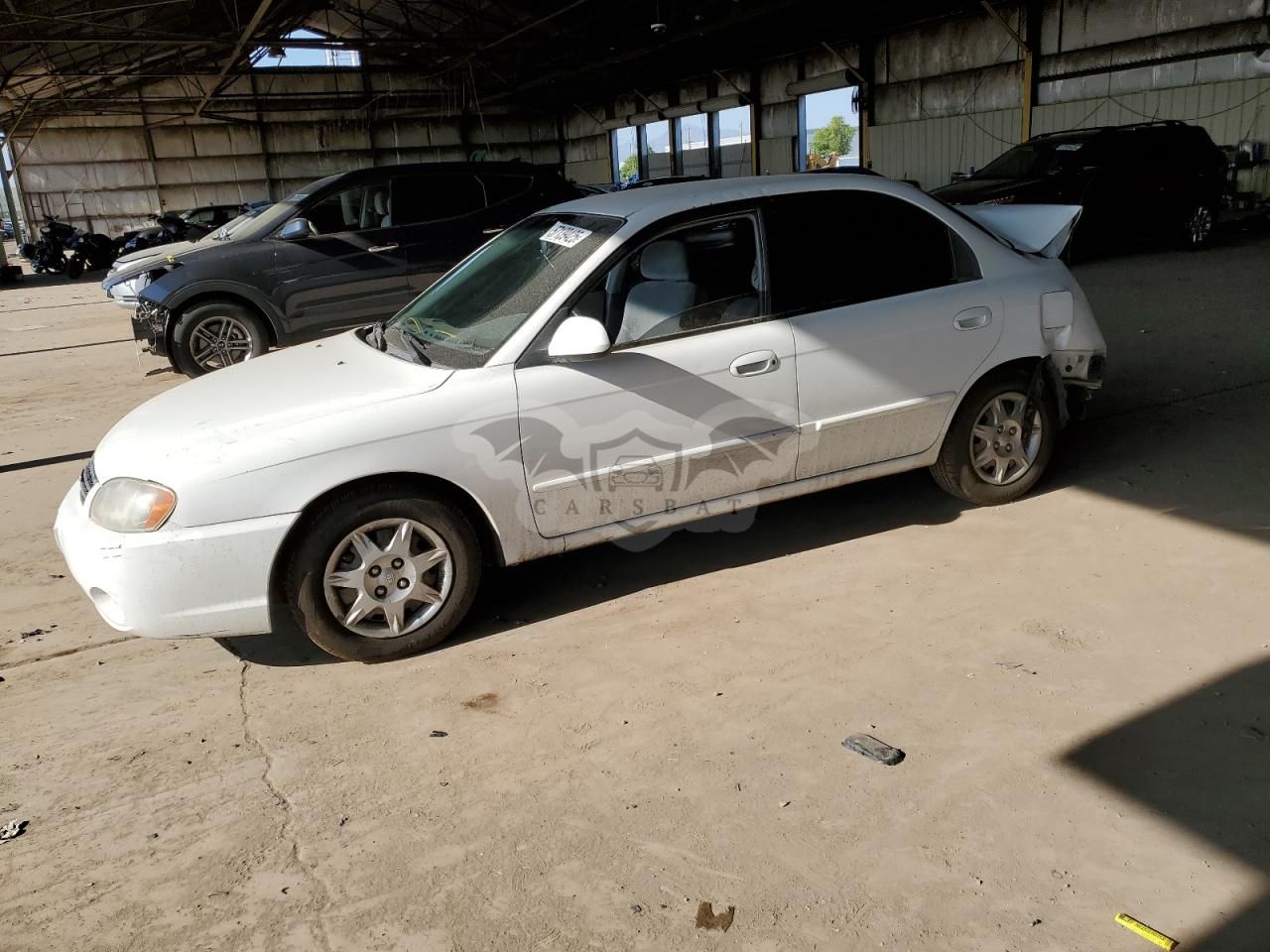 Kia Spectra BASE 1.8L 4 2002