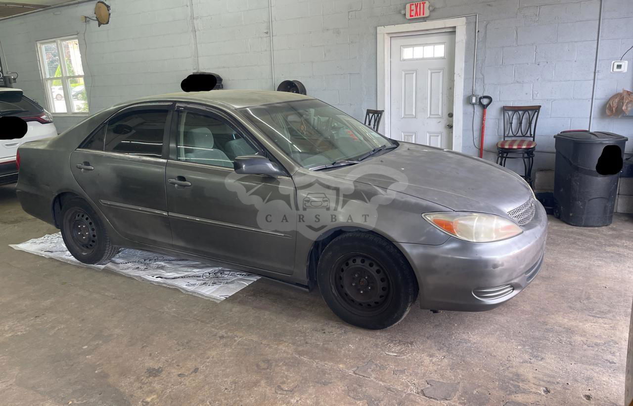 Toyota Camry LE 2.4L  4 2002