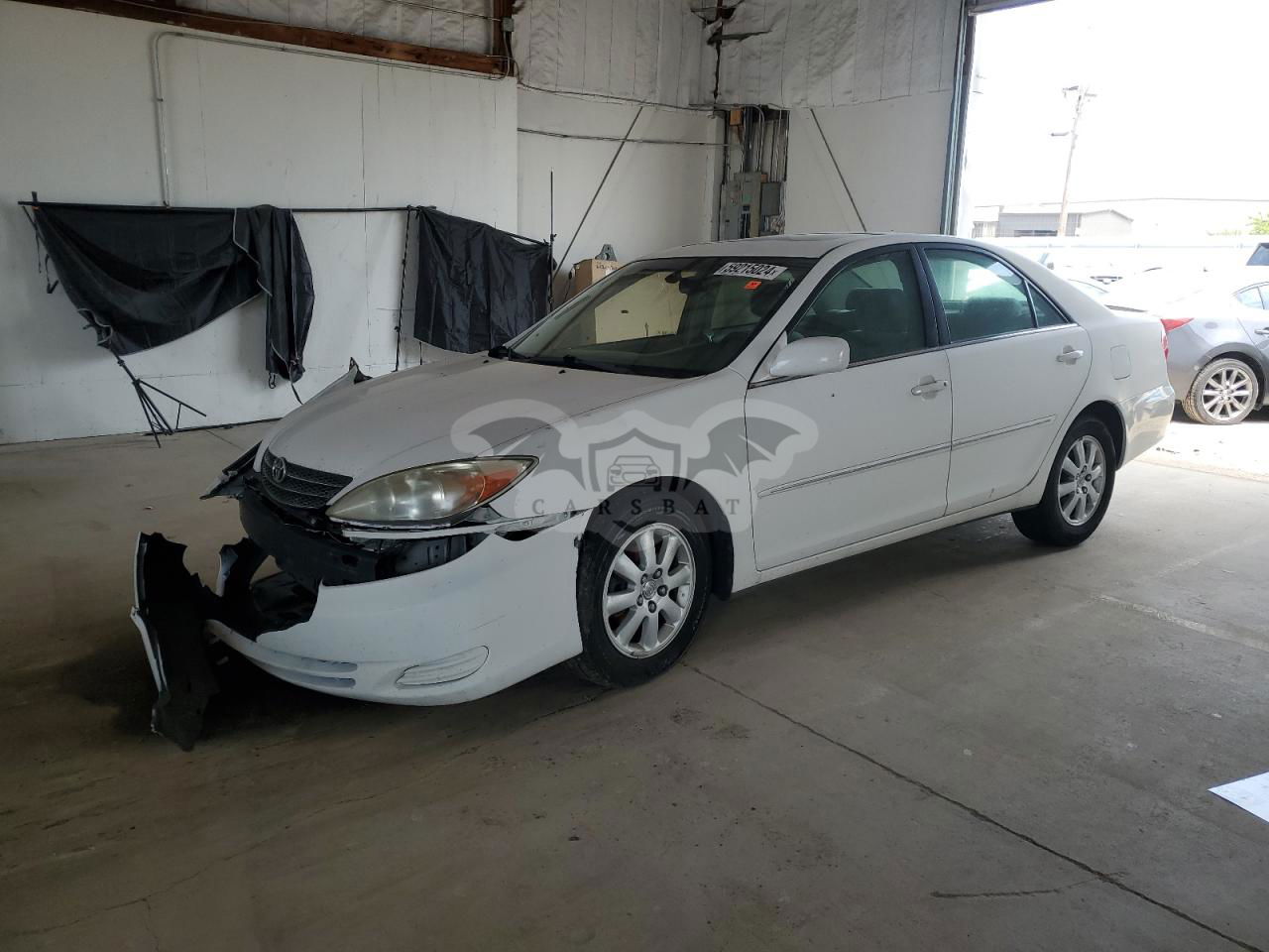 Toyota Camry LE 2.4L  4 2002