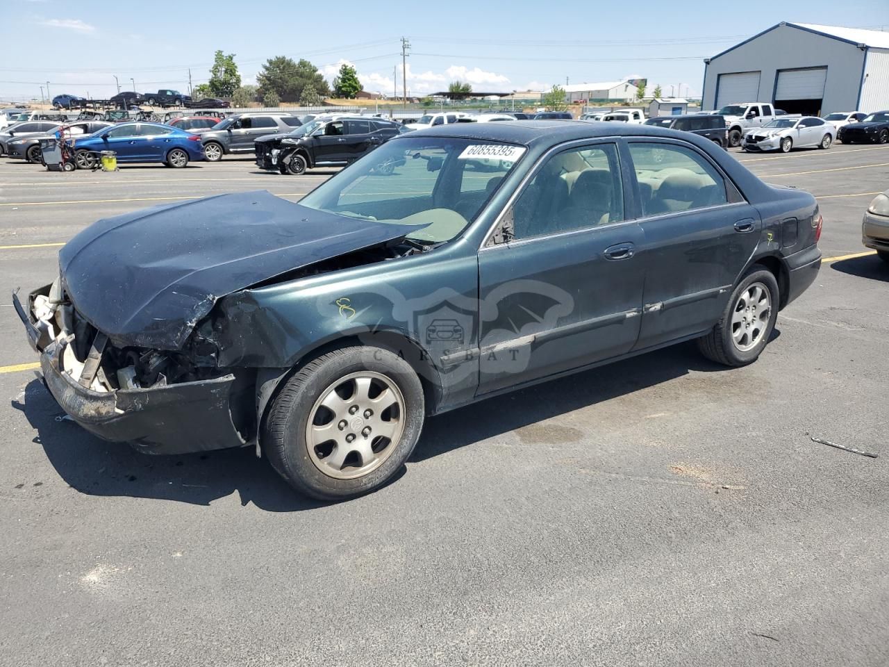 Mazda 626 LX 2.0L 4 2002