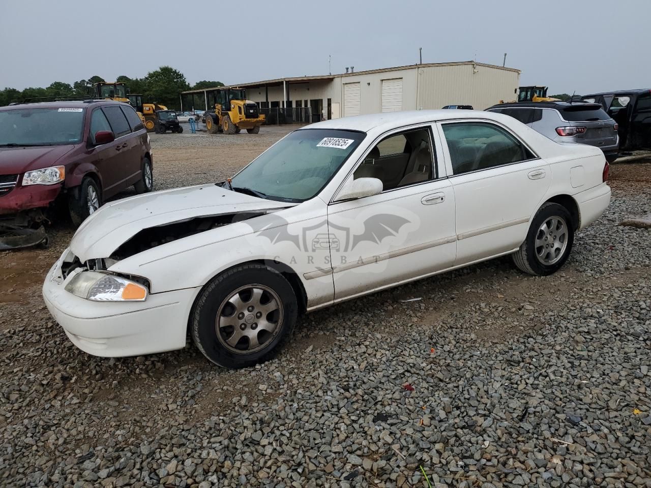 Mazda 626 LX 2.0L 4 2002
