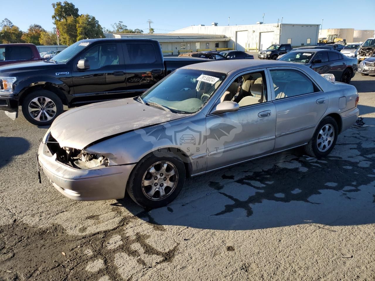 Mazda 626 LX 2.0L 4 2002