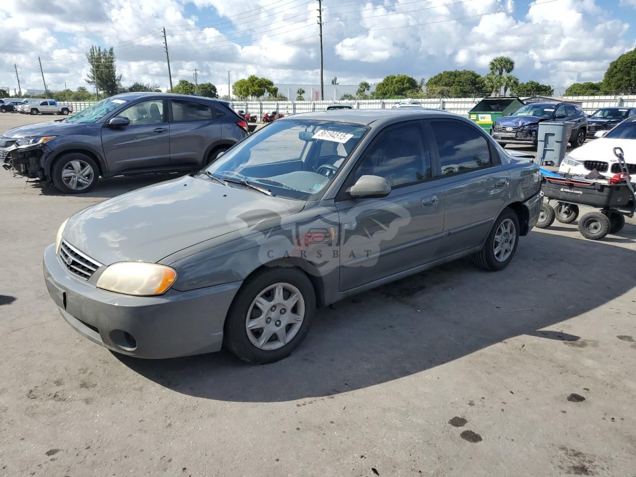 Kia Spectra BASE 1.8L 4 2002