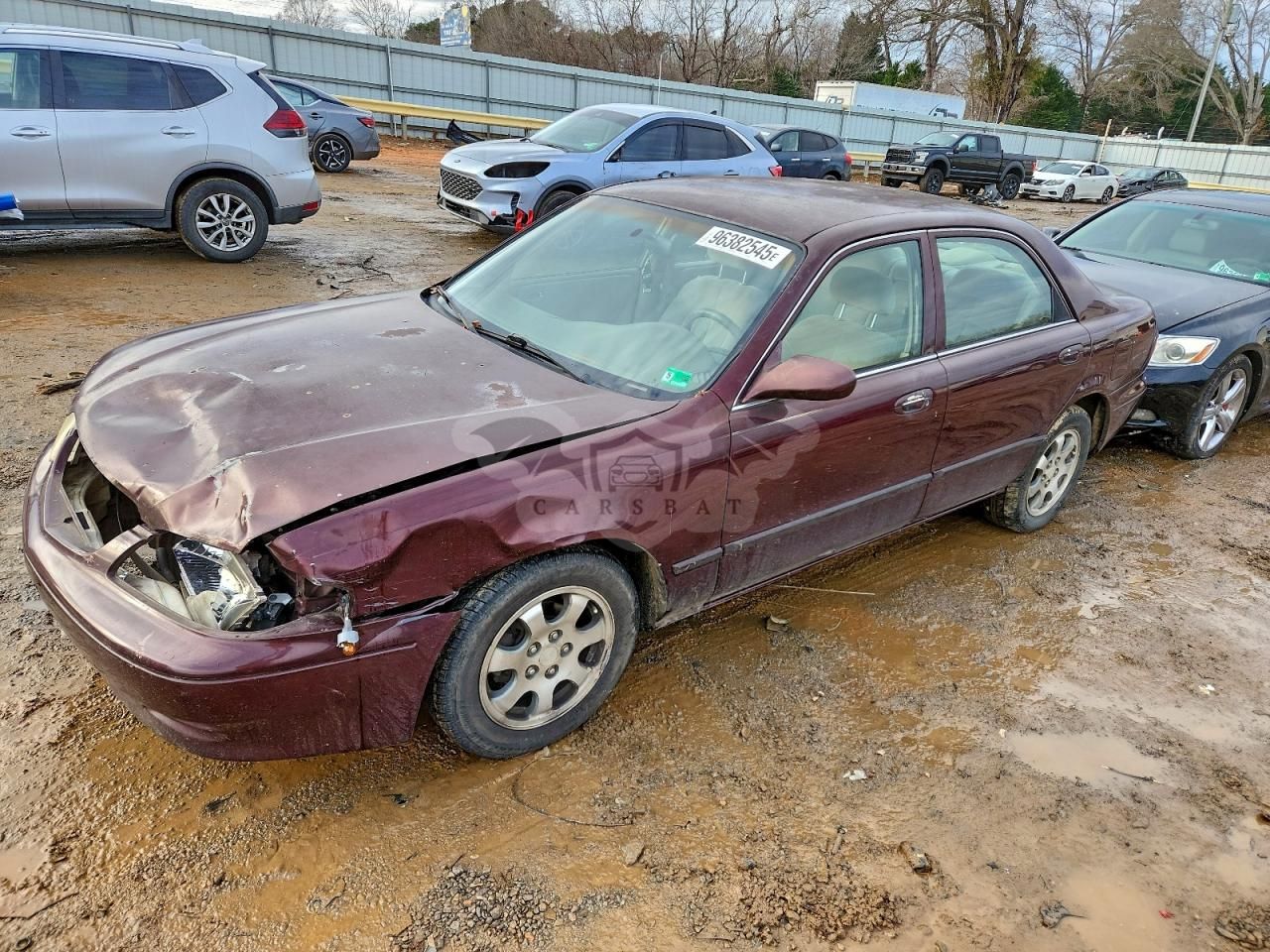 Mazda 626 LX 2.0L 4 2002